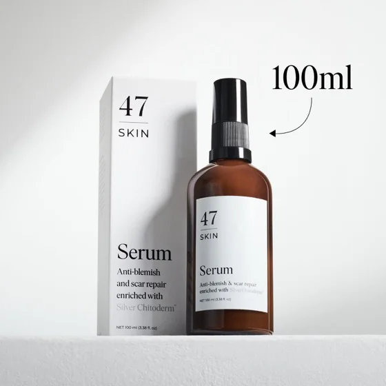 The 100ml 47 Skin serum bottle standing beside its carton