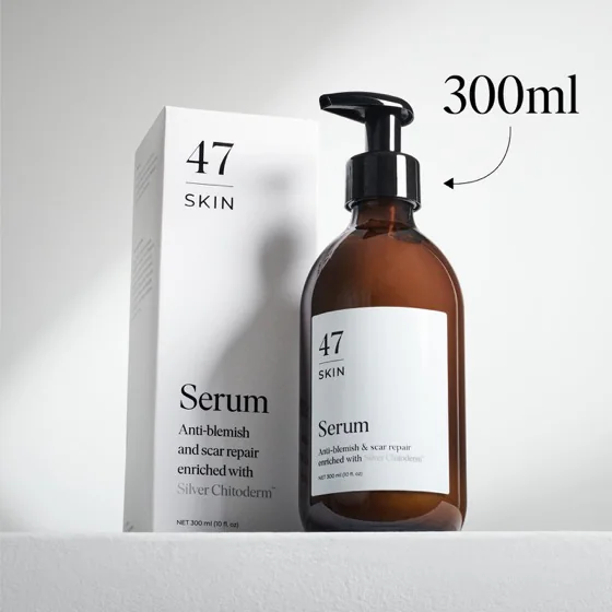 The 300ml 47 Skin serum pump bottle standing beside its carton