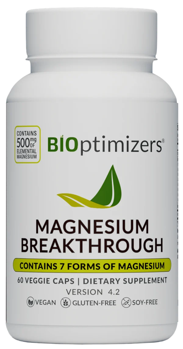 Magnesium Breakthrough bottle photographed by BiOptimizers: a white bottle whose label reads Magnesium Breakthrough, Contains 500 mg of elemental magnesium, Contains 7 forms of magnesium, 60 veggie caps, Version 4.2
