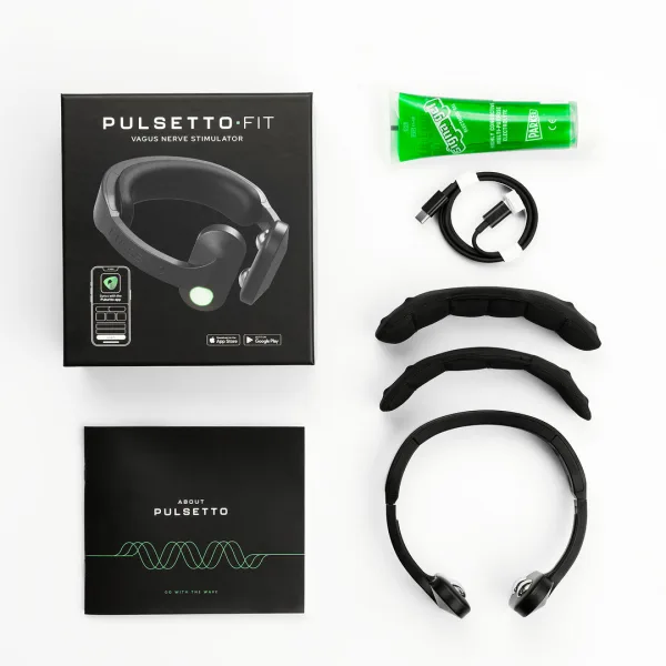 Everything in the Pulsetto Fit box laid out: the boxed device, the neck band, two extra pads, a tube of conductive gel, a USB-C cable and the booklet