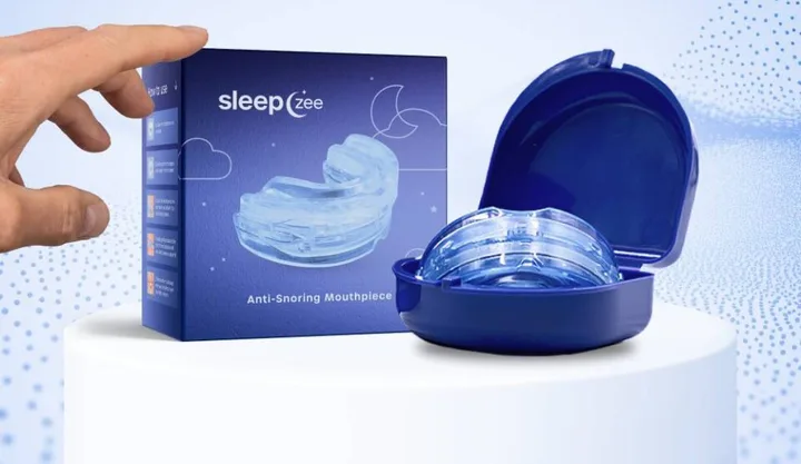 SleepZee box with mouthpiece and blue carrying case
